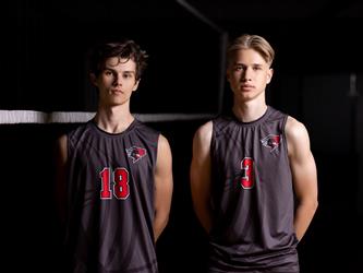 2 Volleyball players posing