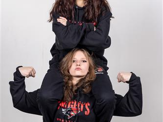 Two wrestling teammates posing