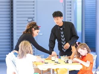 students getting a helping of the food 