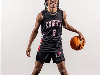 Futures Varsity Basketball Player #2 dribbling