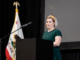 Woman speaking at podium