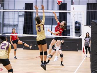 Futures Girls Volleyball team volleying