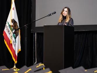 Student speaking at podium