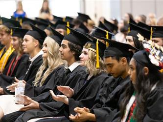 Graduate smiling for camera