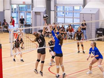 Girls defending the net
