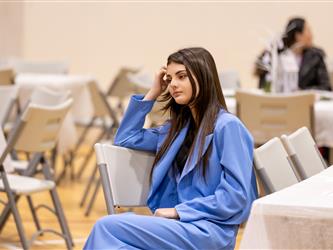 student sitting down