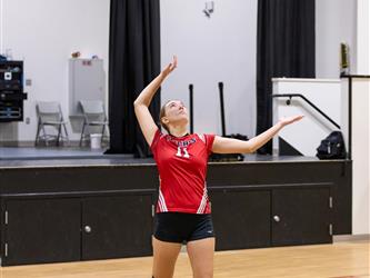 Futures Girls Volleyball team serving