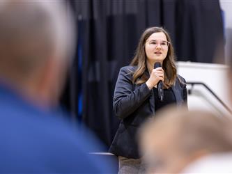 Person speaking into mic