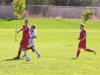 Players chasing ball