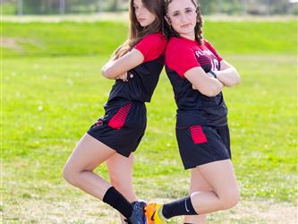Two teammates posing together