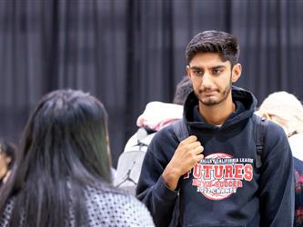 Students speaking with recruiters