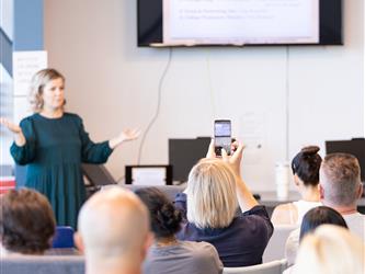 Teacher speaking to parents