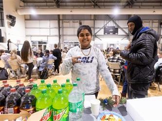 Student at drink table