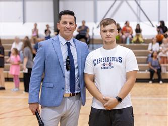 Posing for photo in gym