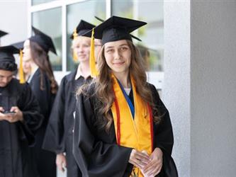 Graduate smiling for camera