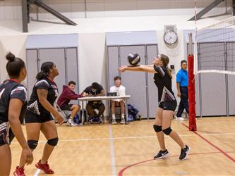 Girl setting ball