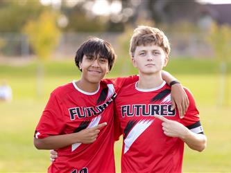 2 Players posing for photo
