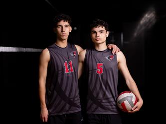 Volleyball players posing together