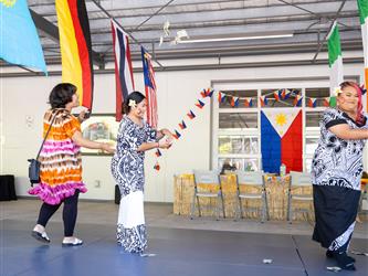 2 students dancing in cultural attire