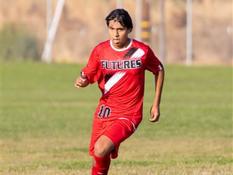 Futures Boy Soccer player running