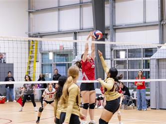 Futures Girls Volleyball team defending