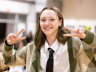Woman giving peace signs