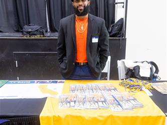 College recruiter at table