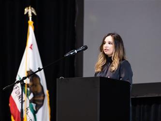 Student speaking at podium
