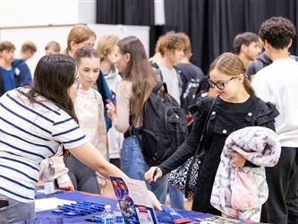 Students speaking with recruiters