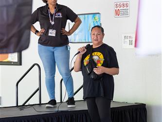 2 students dancing in cultural attire