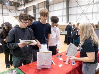 Students speaking with recruiters