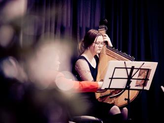 Student playing instrument