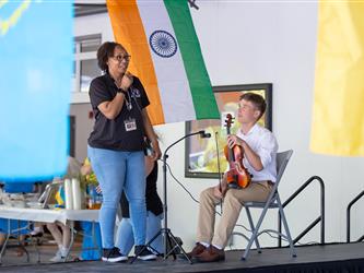 2 students dancing in cultural attire