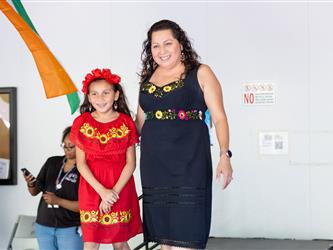 Group picture of those dressed in cultural attire 