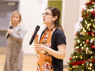Woman speaking to audience